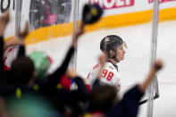 Canada's Connor Bedard celebrates after scoring his sides third goal during the preliminary round match between Great Britain and Canada at the Ice Hockey World Championships in Prague, Czech Republic, Saturday, May 11, 2024. (AP Photo/Petr David Josek)