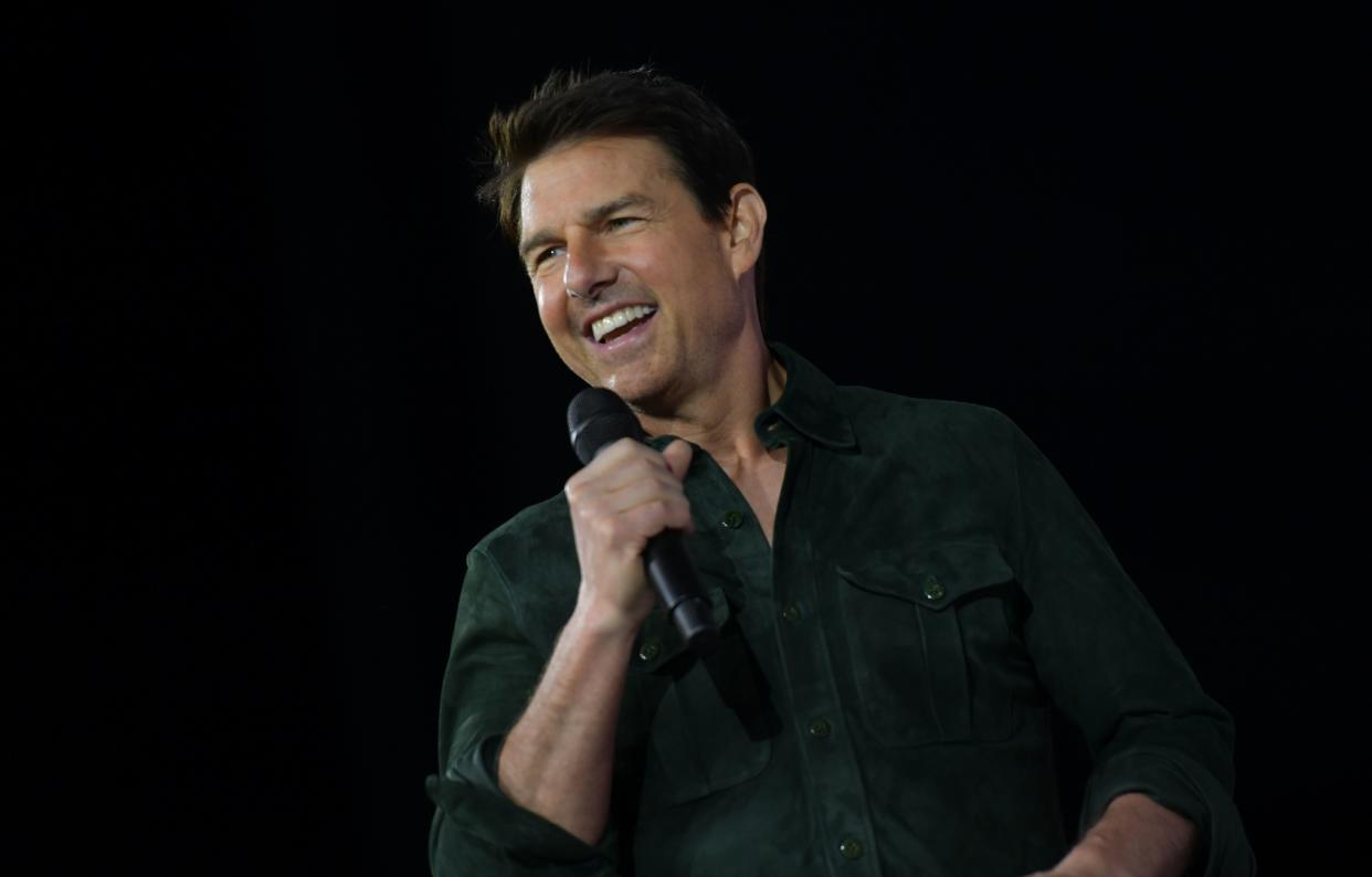 Tom Cruise makes a surprise appearance to promote 'Top Gun: Maverick' at Comic Con on July 18, 2019. (Photo by Chris Delmas/AFP via Getty Images)