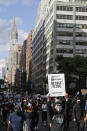 Protesters march through the streets of Manhattan in New York, Monday, June 1, 2020. New York City imposed an 11 p.m. curfew Monday as the nation's biggest city tried to head off another night of destruction erupting amid protests over George Floyd's death. (AP Photo/Seth Wenig)