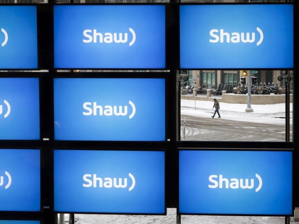  Shaw logos on display at the company’s annual meeting in Calgary, in 2019.