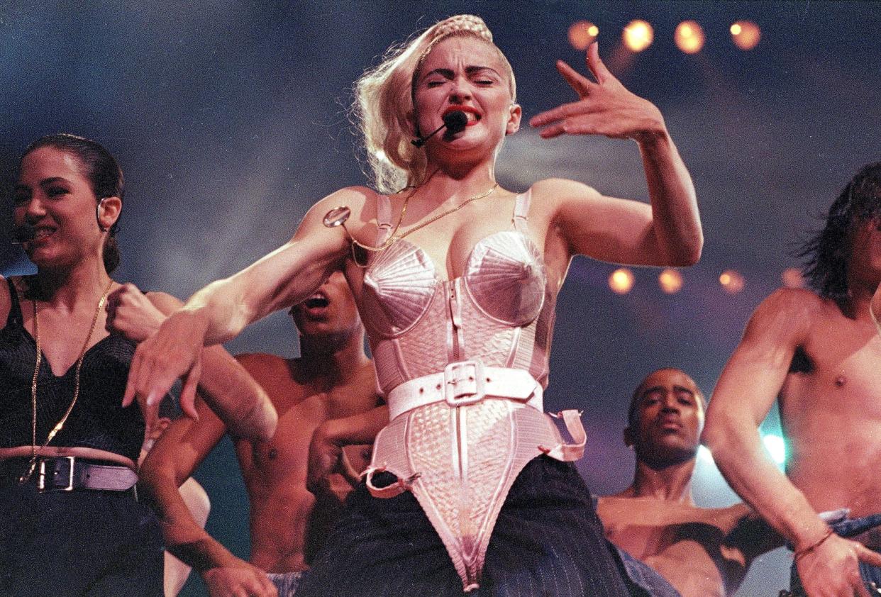 Pop singer Madonna performs during her Blond Ambition tour in Worcester, Mass., on June 4, 1990.