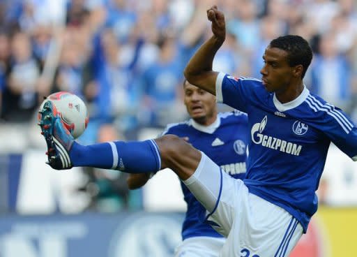 Schalke's Cameroonian defender Joel Matip plays the ball during the German first division Bundesliga football match FC Schalke 04 vs FC Bayern Munich on September 22, in Gelsenkirchen, western Germany. Bayern Munich won the match 2-0