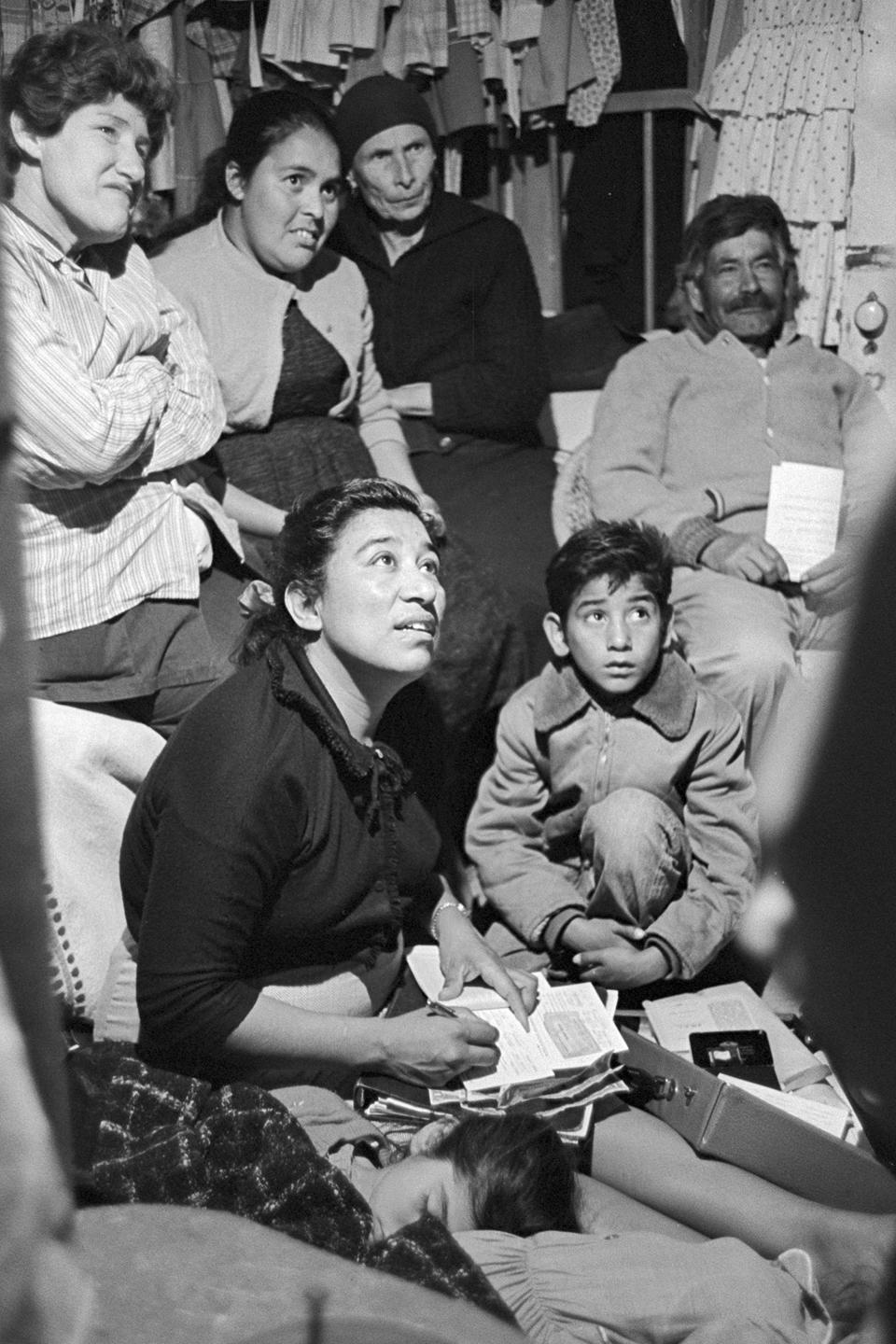 In this undated photo, labor leader Maria Moreno speaks with migrant farmworkers in rural California. A new film dives into the mystery around the Mexican American labor leader who organized farmworkers years before Cesar Chavez and Dolores Huerta and then disappeared from the public eye. (George Ballis/Take Stock via AP)