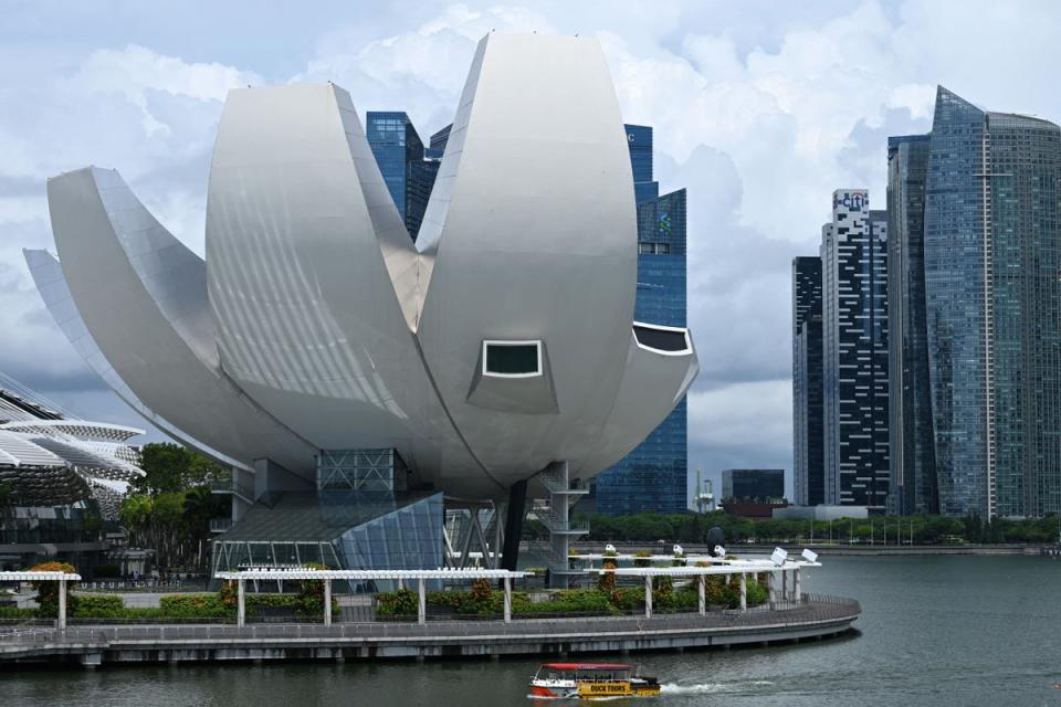 The specacular ArtScience Museum on the waterfront promenade (AFP via Getty Images)