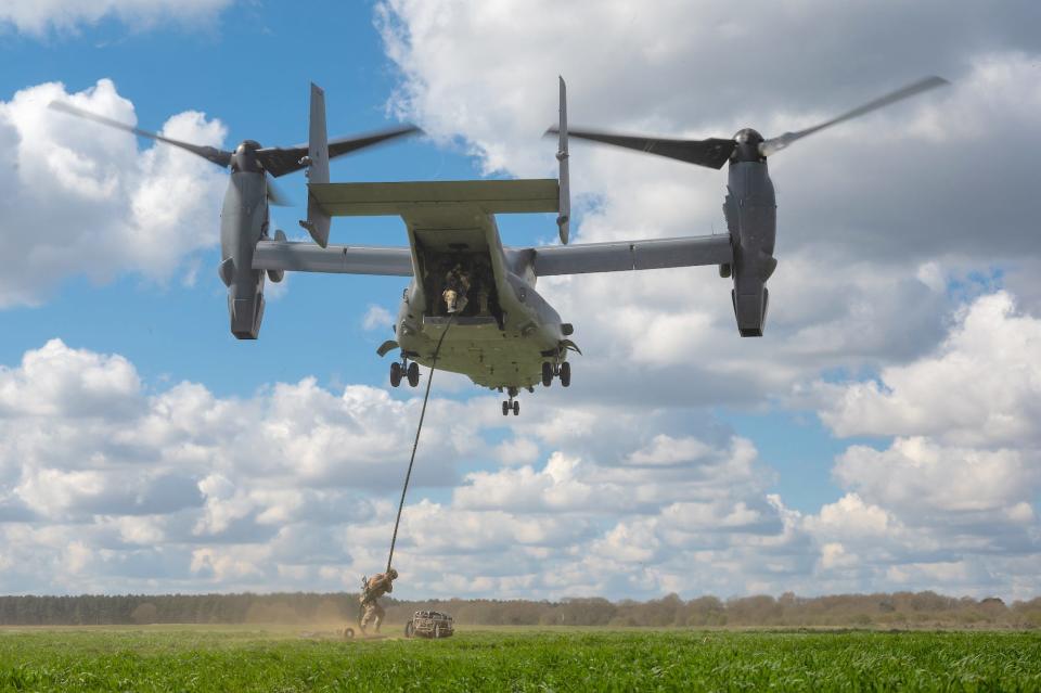 Air Force special tactics fast rope from CV-22B Osprey