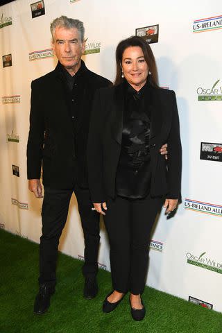 <p>Alberto E. Rodriguez/Getty</p> Pierce Brosnan and Keely Shaye Brosnan pose for a photo together on March 07, 2024