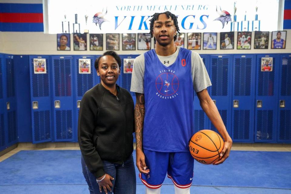 Future Duke University player and McDonald’s All-American, Isaiah Evans, and his mother, Marieke Lemon, in the team locker room at North Mecklenburg High School on Wednesday, February 7, 2024.