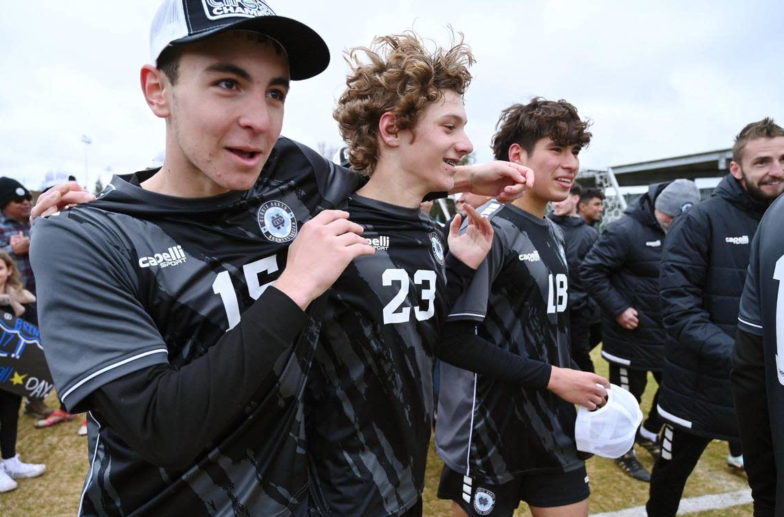 Clovis North’s Garik Mkrtchyan, left, Nixon Hansen, center, and Bryan Lopezz celebrate the team’s 3-1 win against Ridgeview in the Central Section Boys Division I soccer championship Saturday, Feb. 25, 2023 in Clovis. Lopez scored the first and third goal against Ridgeview.