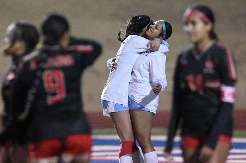 Monterey's Makayla Coronado, center left, hugs teammate Aliza Garcia after Garcia's penalty-kick goal against Coronado in a District 4-5A soccer game Friday, Jan. 27, 2023, at Lowrey Field at PlainsCapital Park.