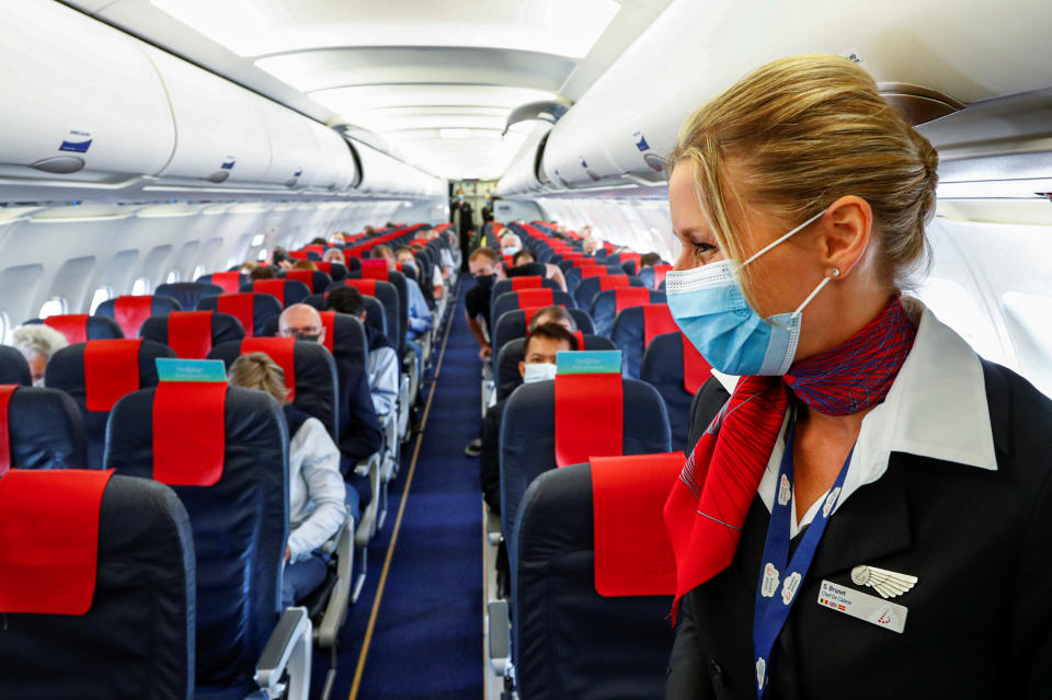 A flight attendant  at the Zaventem International Airport on June 15, 2020. REUTERS/Francois Lenoir