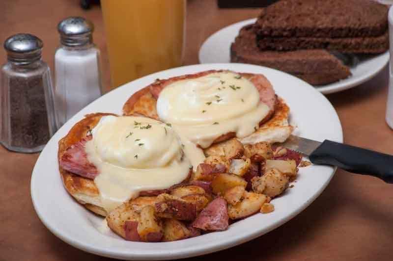 The Famous Phoenix Benedict is a decadent bite at The Phoenix Restaurant.