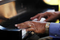 Ellis Marsalis performs at a sunrise concert marking International Jazz Day in New Orleans, Monday, April 30, 2012. The performance, at Congo Square near the French Quarter, is one of two in the United States on Monday; the other is in the evening in New York. Thousands of people across the globe are expected to participate in International Jazz Day, including events in Belgium, France, Brazil, Algeria and Russia. (AP Photo/Gerald Herbert)