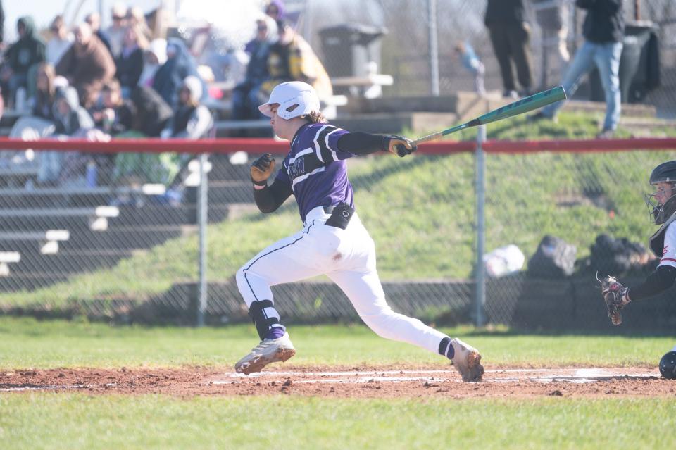 Lakeview senior Zach Kucharczyk swings at a pitch during a game at Marshall High School on Saturday, April 13, 2024.