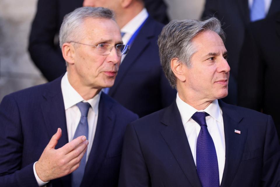 US Secretary of State Antony Blinken and Nato Secretary General Jens Stoltenberg look on as they stand for a group photo on the day of a Nato foreign ministers meeting (REUTERS)