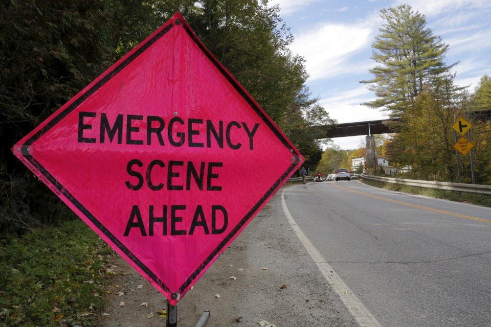 A train trestle crosses over the road in Northfield, Vermont October 5, 2015. REUTERS/Brian Snyder