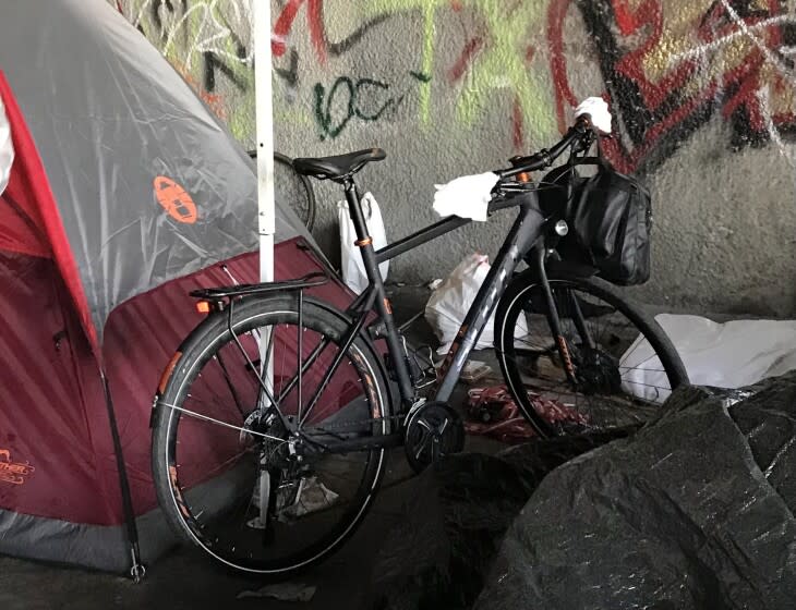 A Scott bike in a homeless encampment on Venice Boulevard under the 405 Freeway.