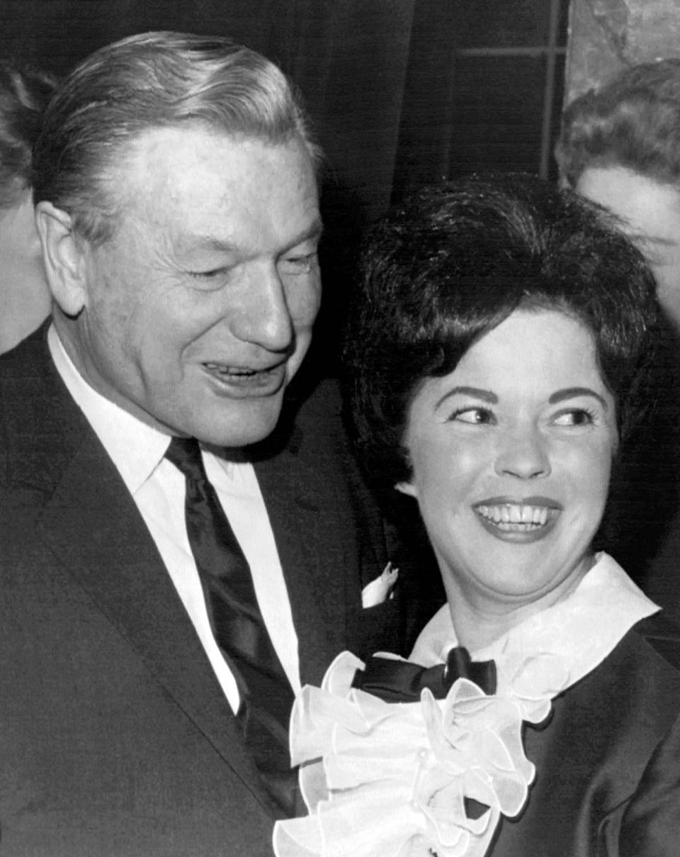 In this Jan. 28, 1968, file photo, New York Republican Gov. Nelson A. Rockefeller and California Republican Shirley Temple Black, a former child actress, laugh during the Women’s National Republican Club luncheon, in New York City. Temple, who died at her home near San Francisco, Monday, Feb. 10, 2014, at 85, sang, danced, sobbed and grinned her way into the hearts of Depression-era moviegoers and remains the ultimate child star decades later. (AP Photo/File)