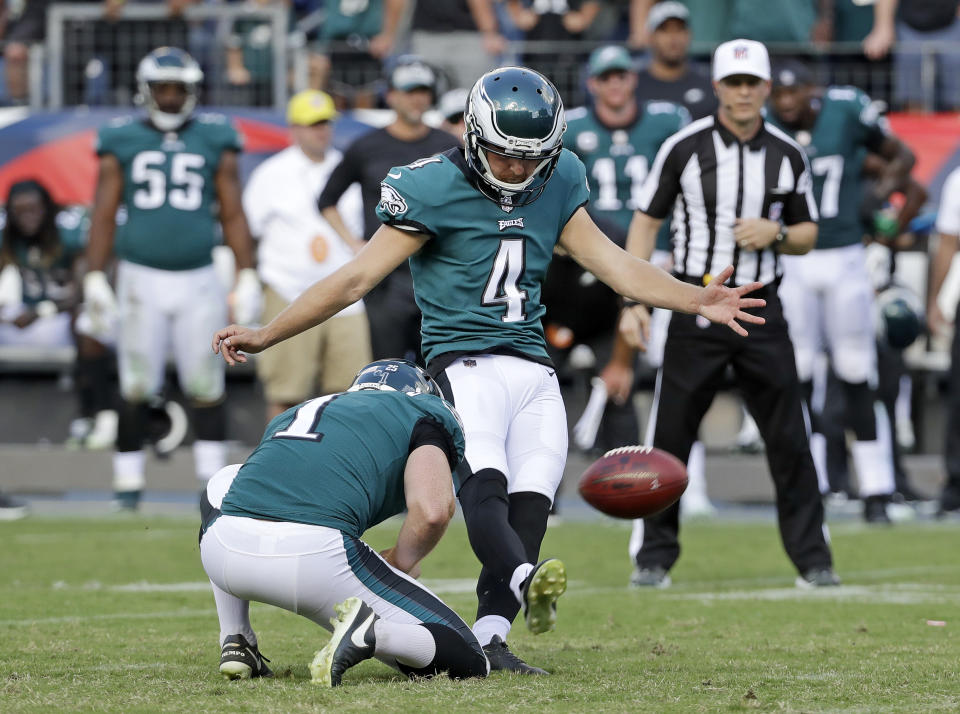 Philadelphia Eagles kicker Jake Elliott (4) kicks a 37-yard field goal against the Tennessee Titans in overtime of an NFL football game Sunday, Sept. 30, 2018, in Nashville, Tenn. Holding is Cameron Johnston (1). (AP Photo/James Kenney)