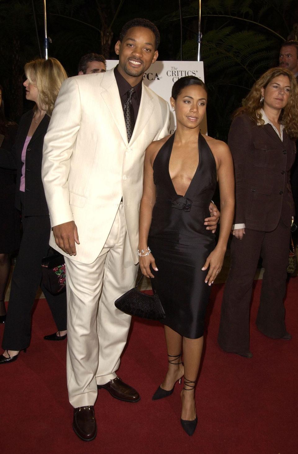 Will Smith and Jada Pinkett Smith at a red carpet on January 10, 2002.