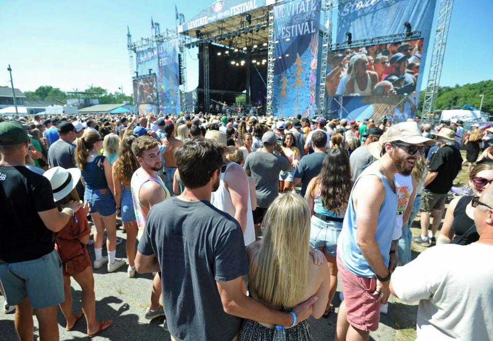 Hundreds gather in front of the Stoke Stage as the Marshfield-based raggae-rock band, Elovaters, perform during the annual Levitate Music Festival at the Marshfield Fairgrounds, Saturday, July 9, 2022.