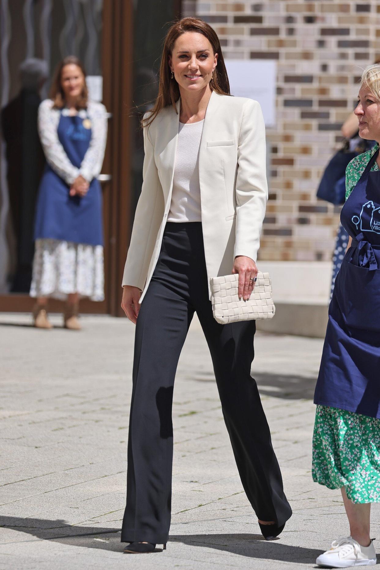 Kate Middleton Black Pants and White Suit Little Village's Hub Appearance