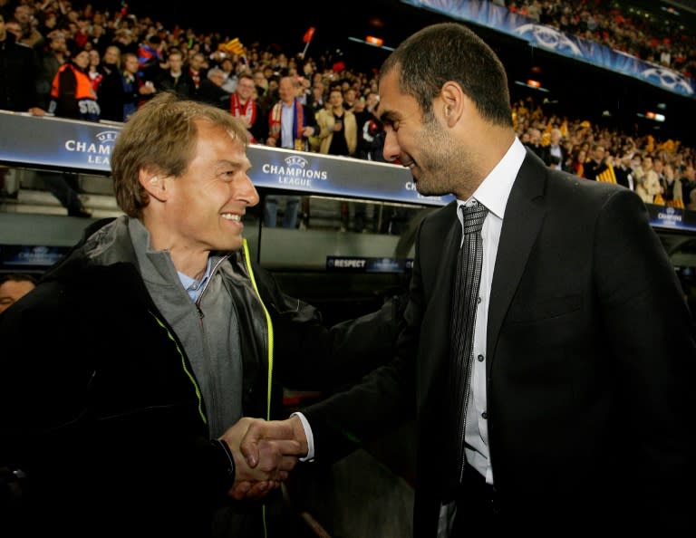 Pep Guardiola (R) shakes hands with Jurgen Klinsmann before a Champions League match in April 2009, but the pair had very different experiences as head coach of Bayern Munich