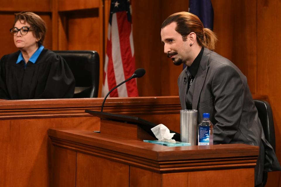 SATURDAY NIGHT LIVE -- Selena Gomez, Post Malone Episode 1825 -- Pictured: (l-r) Cecily Strong and Kyle Mooney during the Trial Witness Cold Open on Saturday, May 14, 2022 -- (Photo by: Will Heath/NBC/NBCU Photo Bank via Getty Images)