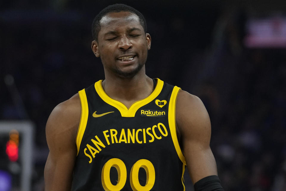 Golden State Warriors forward Jonathan Kuminga reacts during the first half of the team's NBA basketball game against the Chicago Bulls, Thursday, March 7, 2024, in San Francisco. (AP Photo/Godofredo A. Vásquez)