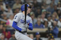 Los Angeles Dodgers' Freddie Freeman watches his RBI single against the San Diego Padres during the 10th inning of a baseball game Wednesday, Sept. 28, 2022, in San Diego. (AP Photo/Gregory Bull)