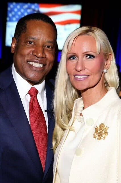 In this undated photo provided by Alexandra Datig, Larry Elder, a Republican candidate in the recall against Gov. Gavin Newsom poses with Datig his former fiancee. Datig said Thursday, Aug. 19, 2021, that Elder once displayed a gun to her during a heated argument in 2015. Elder said he never brandished a gun at anyone. (Courtesy of Alexandra Datig via AP)