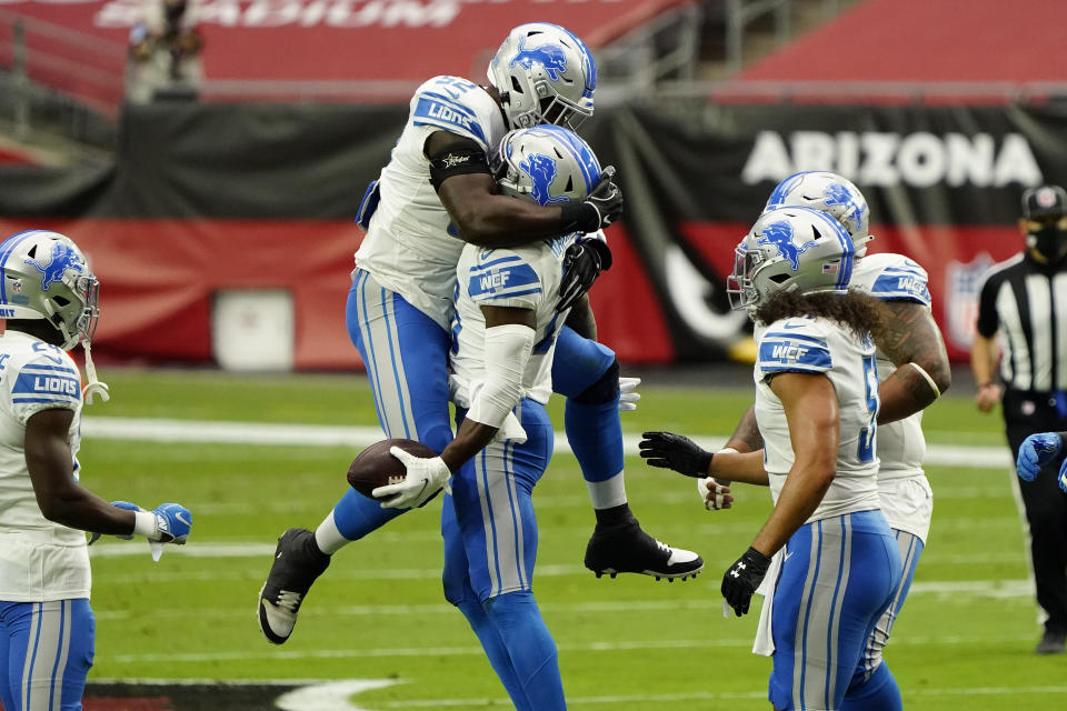 Detroit Lions strong safety Duron Harmon celebrates his interception against the Arizona Cardinals with Detroit Lions outside linebacker Christian Jones, left, during the first half of an NFL football game, Sunday, Sept. 27, 2020, in Glendale, Ariz. (AP Photo/Rick Scuteri)