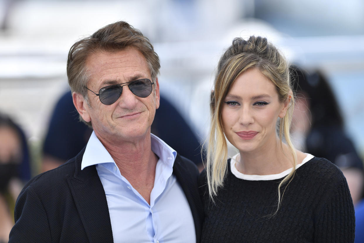 CANNES, FRANCE - JULY 11: US actor and director Sean Penn (L) and US actress Dylan Penn (R) pose during a photocall for the film 