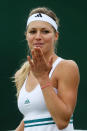 LONDON, ENGLAND - JULY 02: Maria Kirilenko of Russia celebrates match point during her Ladies' singles fourth round match against Shuai Peng of China on day seven of the Wimbledon Lawn Tennis Championships at the All England Lawn Tennis and Croquet Club on July 2, 2012 in London, England. (Photo by Julian Finney/Getty Images)