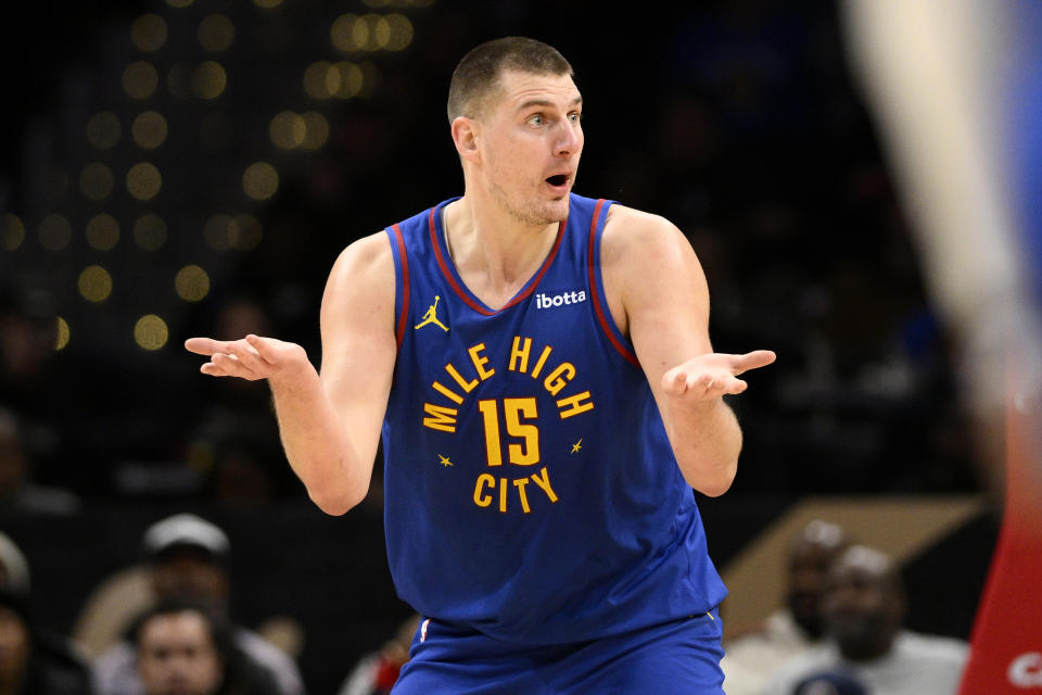 Denver Nuggets center Nikola Jokic gestures after he was called for a foul during the first half of an NBA basketball game against the Washington Wizards, Sunday, Jan. 21, 2024, in Washington. (AP Photo/Nick Wass)