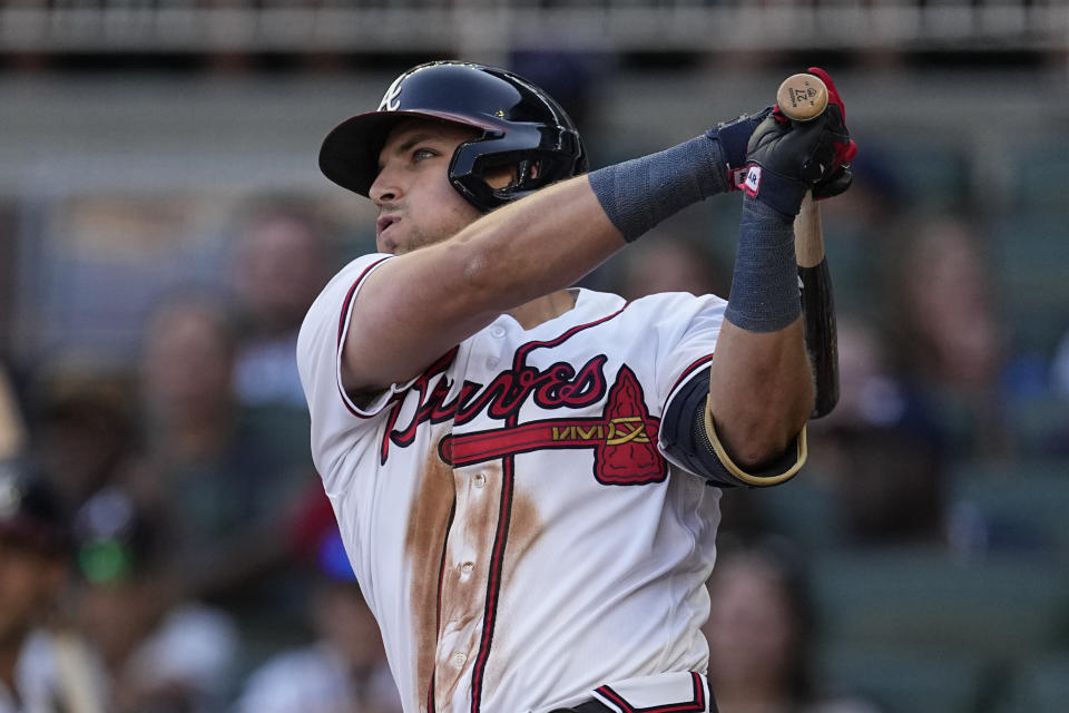 Atlanta Braves' Austin Riley watches his two-run home run against the Minnesota Twins during the first inning of a baseball game Tuesday, June 27, 2023, in Atlanta. (AP Photo/John Bazemore)