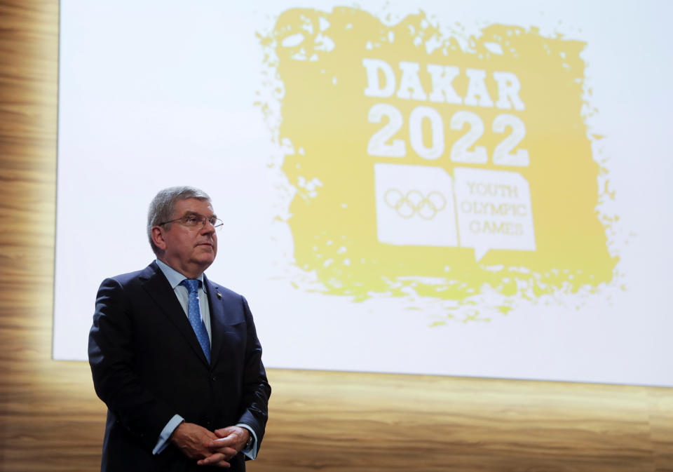 Thomas Bach, President of the International Olympic Committee (IOC), stands next to a Dakar 2022 Youth Olympic Games logo after signing the contract for the 2022 candidacy with Senegal at the 133rd IOC session in Buenos Aires, Argentina October 8, 2018. Natacha Pisarenko/Pool via REUTERS