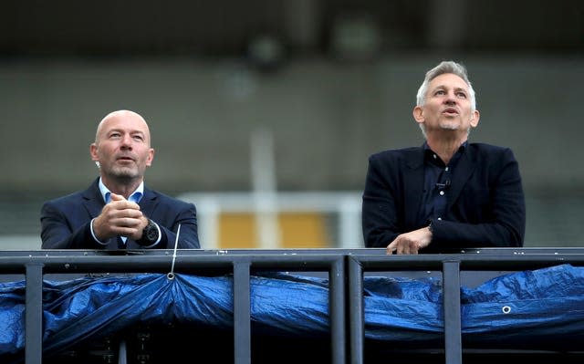 Alan Shearer (left) was working at the game as a pundit