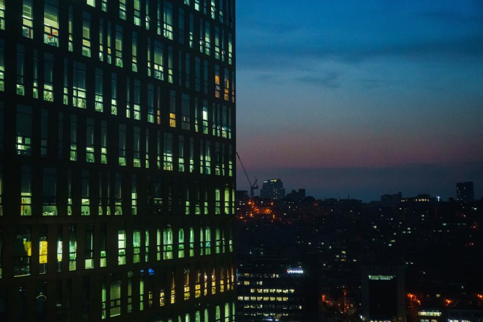 Windows light up in the evening in Seoul