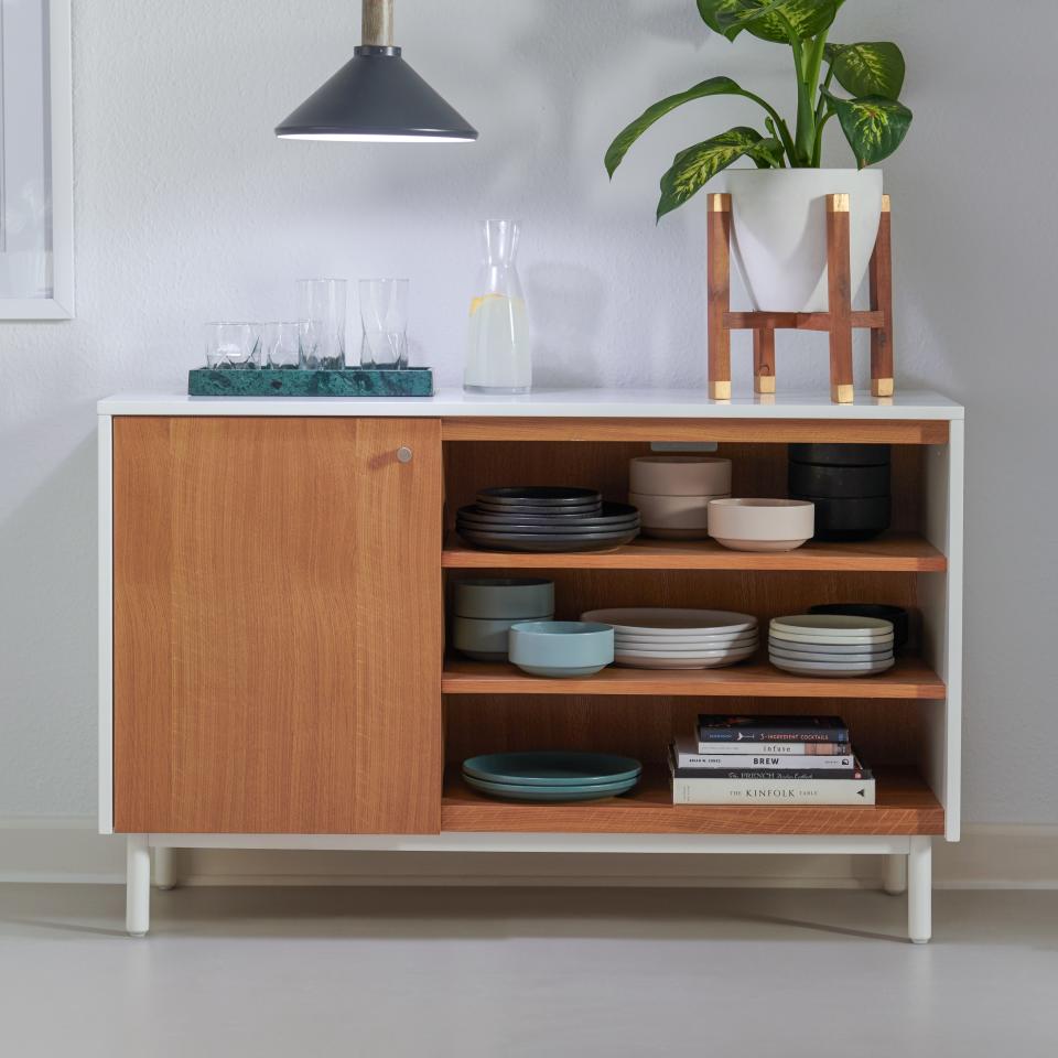 <a rel="nofollow noopener" href="https://www.walmart.com/ip/MoDRN-Scandinavian-Finna-One-Door-Credenza/870546938" target="_blank" data-ylk="slk:SHOP NOW;elm:context_link;itc:0;sec:content-canvas" class="link ">SHOP NOW</a>: MoDRN Scandinavian Finna One Door Credenza, $349