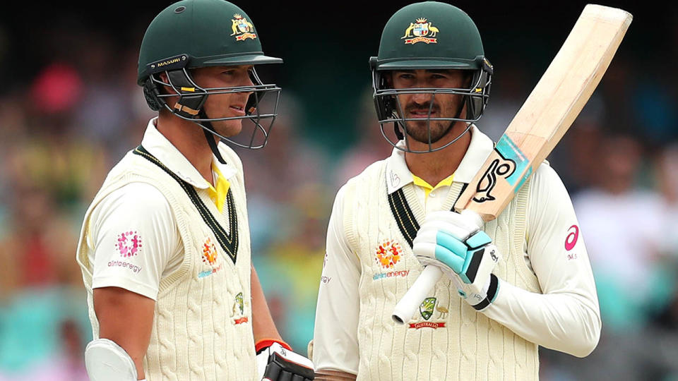 Josh Hazlewood and Mitchell Starc. (Photo by Cameron Spencer/Getty Images)