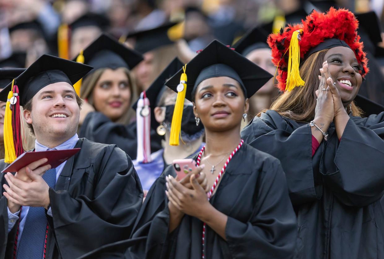 University of Georgia graduates and their family and friends attend the 2021 Fall Commencement ceremony at Sanford Stadium on Friday, Dec. 17, 2021 in Athens. Thousands gathered to celebrate the fall class of 2021. 