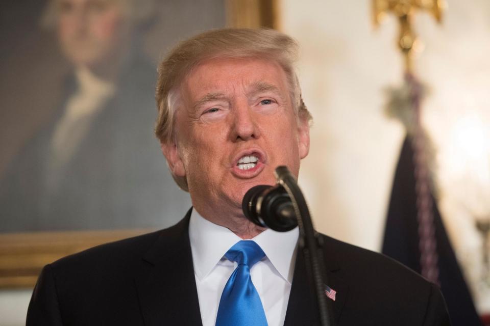 Donald Trump: The US President lashed out over reports he watches eight hours of TV a day as a major incident unfolded in New York: AFP/Getty Images
