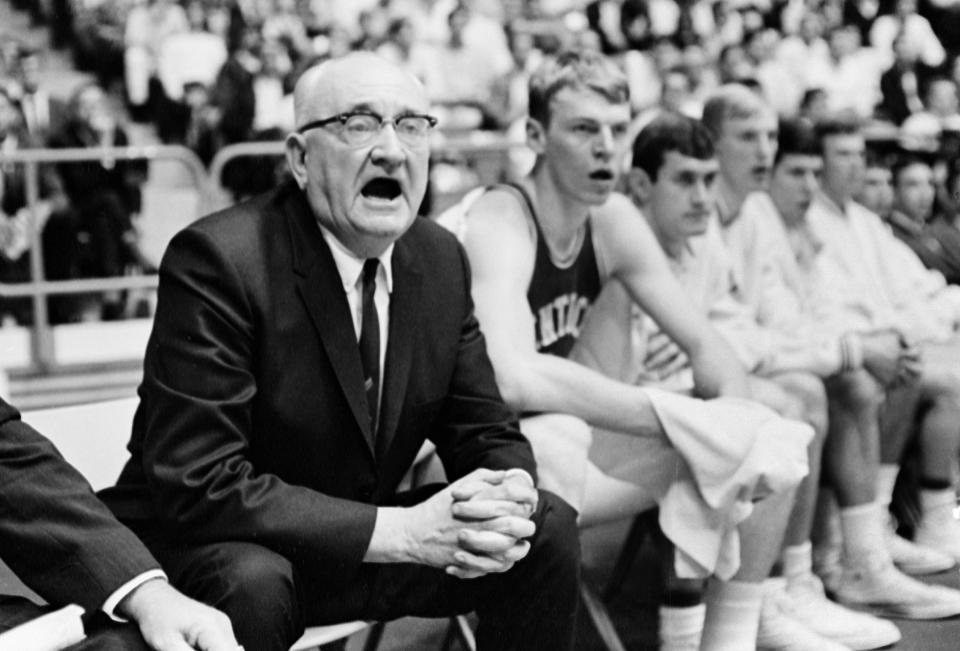 **ADVANCE FOR WEEKNED OF JAN 21-22 -- FILE** Kentucky coach Adolph Rupp clasps his hands and offers verbal support to his nationally ranked Wildcats against Mississippi at Oxford, Miss., in this Jan. 29, 1968, file photo. Actor Jon Voight's portrayal of the late Adolph Rupp in the motion picture "Glory Road" has opened a sensitive debate whether the legendary coach was a racist. (AP Photo/File)