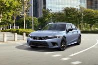 This photo provided by Honda shows the 2024 Honda Civic Si, a four-door sedan with a peppy four-cylinder engine and a manual transmission. (American Honda Motor Co. via AP)