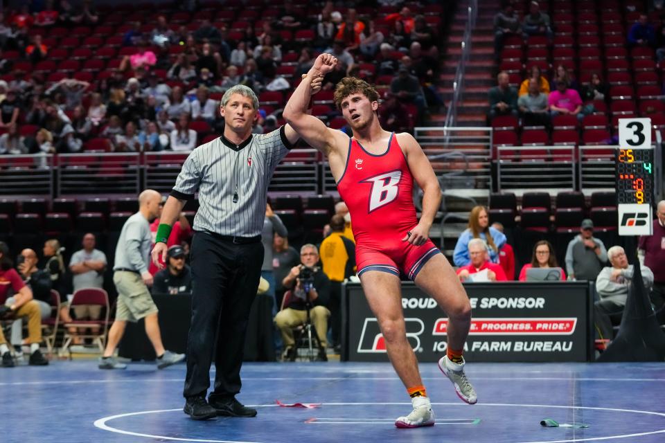 Ballard’s Gabe Christensen gets his hand raised after defeating South Tama County’s Gavin Bridgewater at 195 pounds during the semifinals of the Class 2A of the Iowa high school state wrestling tournament at Wells Fargo Arena in Des Moines on Friday, Feb. 17, 2023.