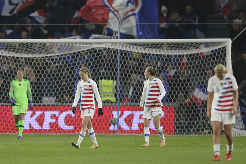 US players walk along the pitch after France scored a second goal during a women's international friendly soccer match between France and United States at the Oceane stadium in Le Havre, France, Saturday, Jan. 19, 2019. (AP Photo/David Vincent)