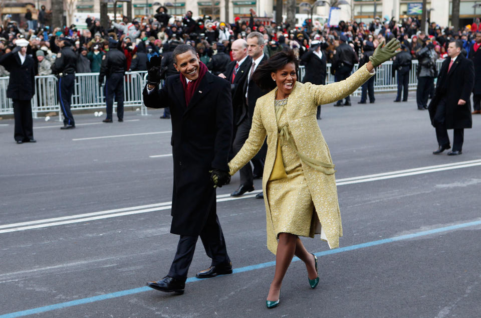 <p>President Barack Obama and first lady Michelle Obama walk the inaugural parade route in Washington, Jan. 20, 2009. (AP Photo/Charles Dharapak) </p>