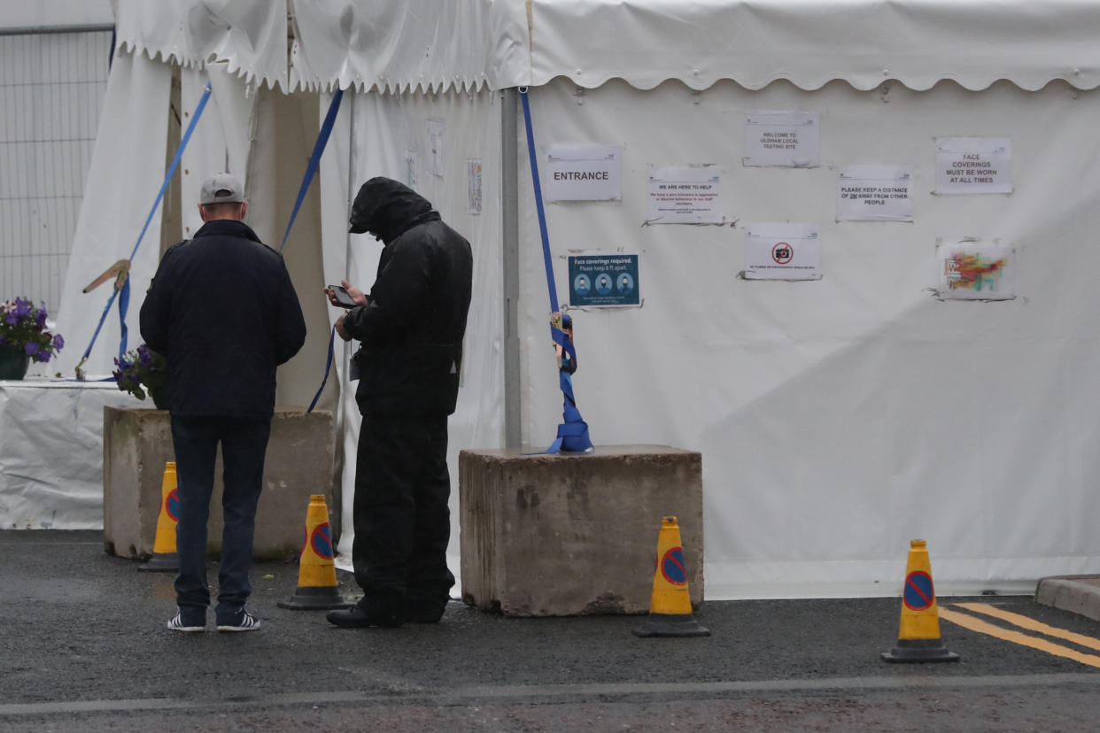 A walk-in coronavirus testing centre on Southgate Street, Oldham, Greater Manchester, as people living in Oldham, Blackburn, and Pendle in Lancashire have been told not to socialise with anyone outside their household and avoid using public transport unless it is essential. The localised measures have been introduced following a rise in people testing positive for coronavirus.