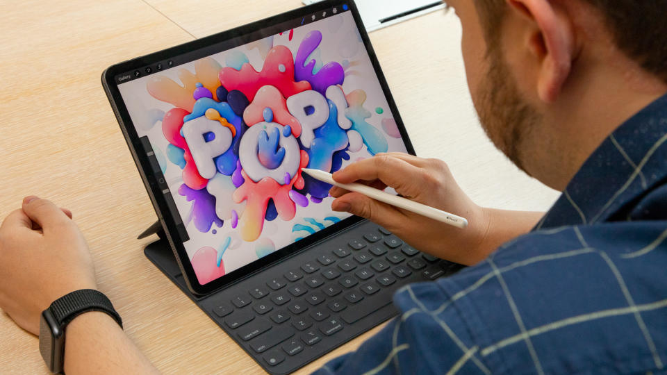 Our reviewer using an Apple Pencil on the Apple iPad Pro (2018)