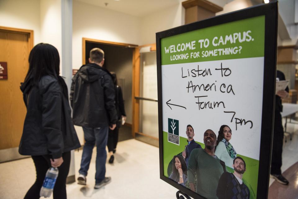 A sign directs guests to the "Vouchers: The Economics and Academics of Choice" event at Ivy Tech Community College in Fort Wayne.
